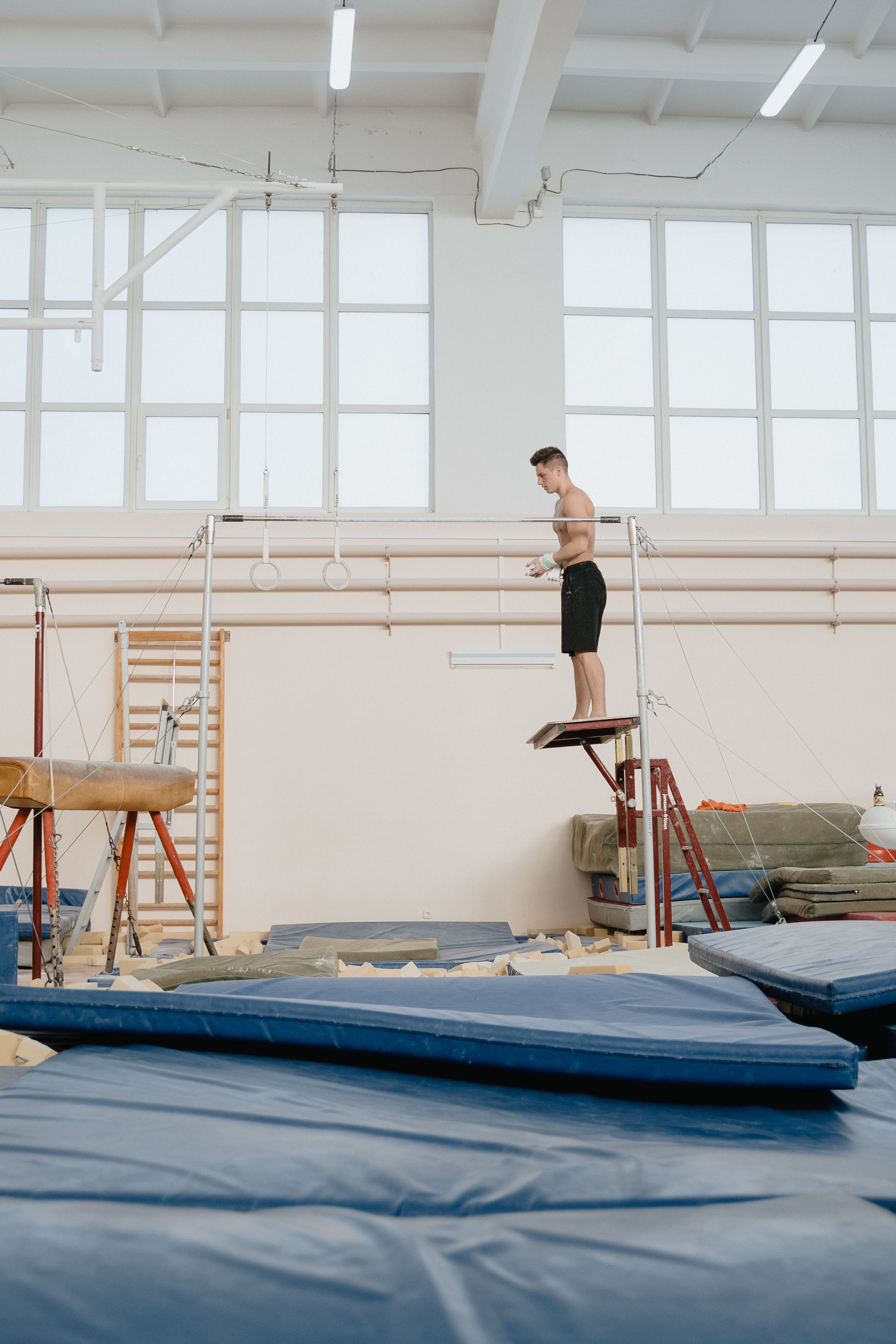 Young gymnast performing on balance beam